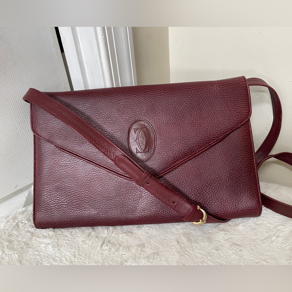 Cartier burgundy leather bag GUC